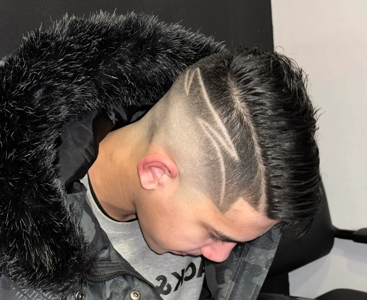 Corte con textura y fade bajo — PRO Barbershop